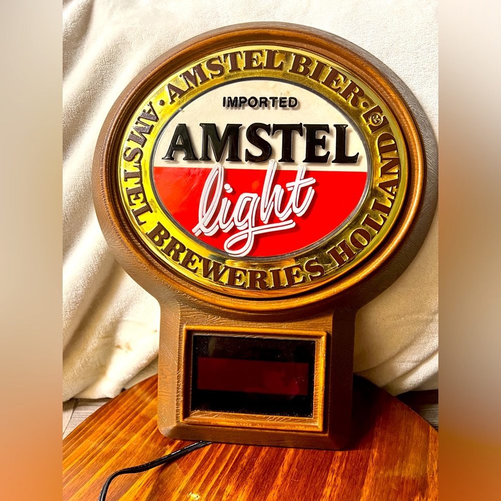 Vintage Amstel Light Beer plastic hard wired wall clock, rare man cave. Add plug
